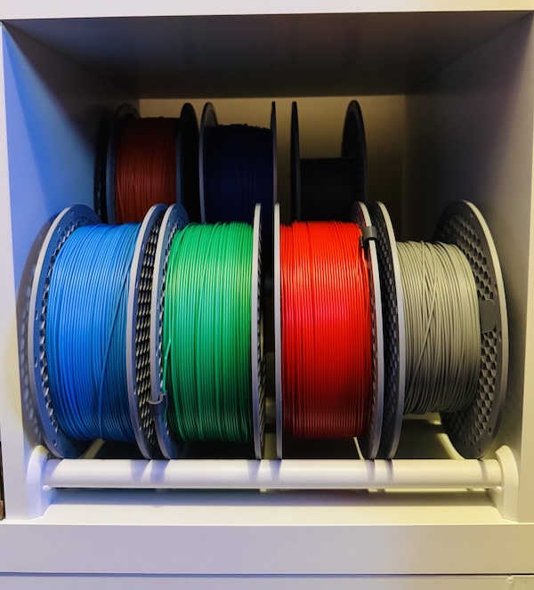 Filament spool rack full of filament